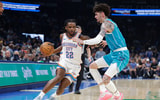 Oct 9, 2025; Oklahoma City, Oklahoma, USA; Oklahoma City Thunder guard Cason Wallace (22) drives around Charlotte Hornets guard Lamelo Ball (1) during the second quarter of a game between the Charlotte Hornets and the Oklahoma City Thunder at Paycom Center. Mandatory Credit: Alonzo Adams-Imagn Images