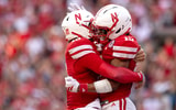 Nebraska football QB Dylan Raiola and WR Nyziah Hunter (right) celebrate Hunter's TD catch during the Huskers' 38-27 win over Michigan State