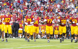 The USC Trojans take the field against Michigan