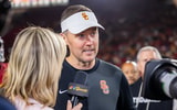 USC head coach Lincoln Riley speaks postgame following a win against Michigan