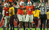 Sep 6, 2025; Miami Gardens, Florida, USA; Miami Hurricanes defensive lineman Rueben Bain Jr. (4) reacts after a sack against the Bethune-Cookman Wildcats during the third quarter at Hard Rock Stadium. Mandatory Credit: Sam Navarro-Imagn Images