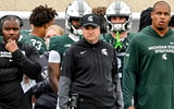 Michigan State's head coach Jonathan Smith, center, looks on from the sideline during the third quarter in the game against UCLA on Saturday, Oct. 11, 2025, at Spartan Stadium in East Lansing. - USA TODAY Sports