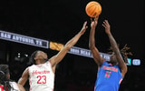 Apr 7, 2025; San Antonio, TX, USA; Florida Gators guard Denzel Aberdeen (11) shoots over Houston Cougars guard Terrance Arceneaux (23) in the first half in the national championship game of the Final Four of the 2025 NCAA Tournament at the Alamodome. Mandatory Credit: Robert Deutsch-Imagn Images