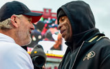 Utah HC Kyle Whittingham, Colorado HC Deion Sanders