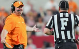 Brianna Paciorka/News Sentinel / USA TODAY NETWORK via Imagn Images | Tennessee coach Josh Heupel talks with an official during a college football game at Bryant-Denny Stadium in Tuscaloosa, Ala., on Oct. 18, 2025.