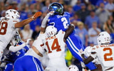 Oct 18, 2025; Lexington, Kentucky, USA; Kentucky Wildcats running back Dante Dowdell (2) attempts to score a touchdown but comes up short in overtime against the Texas Longhorns at Kroger Field. Mandatory Credit: Jordan Prather-Imagn Images
