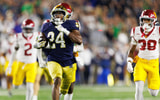 Notre Dame running back Jadarian Price (24) returns a kick for a touchdown in the second half of a NCAA football game against USC at Notre Dame Stadium on Saturday, Oct. 18, 2025, in South Bend