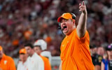 Brianna Paciorka/News Sentinel / USA TODAY NETWORK via Imagn Images | Tennessee coach Josh Heupel points to the running clock while yelling at the referees for a timeout during a college football game between Tennessee and Alabama at Bryant-Denny Stadium in Tuscaloosa, Ala., on Oct. 18, 2025.