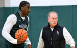 Michigan State's coach Tom Izzo, left, talks with Coen Carr, left, and Denham Wojcik during the first day of basketball practice on Monday, Sept. 22, 2025, at the Breslin Center in East Lansing. - Nick King, USA TODAY Sports