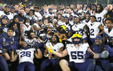 Michigan with Paul Bunyan Trophy in 2023