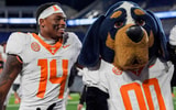 Tennessee wide receiver Braylon Staley (14) smiles as he stands next to Smokey after winning a NCAA football game against Kentucky at Kroger Field in Lexington, Kentucky on Oct. 25, 2025.