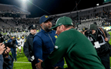 Sherrone Moore Jonathan Smith handshake