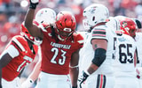Louisville Cardinals defensive lineman Wesley Bailey (23) had a stop on Bowling Green Falcons wide receiver Allen Middleton (1) in the first half against Bowling Green at L&N Federal Credit Union Stadium in Louisville, Kentucky Sept. 20, 2025.