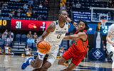 West Virginia forward Brenen Lorient drives to the basketball against Wheeling - Credit: WVSports.com