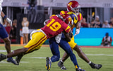 USC safety Bishop Fitzgerald makes a tackle against the Michigan Wolverines