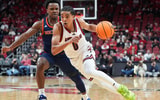 Louisville Cardinals guard Mikel Brown Jr. (0) drives by Bucknell Bison guard Jayden Williams (2) during an exhibition game at the KFC Yum! Center in Louisville, Kentucky Tuesday October 28, 2028.