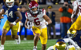 USC Trojans wide receiver Makai Lemon (6) breaks a tackle by Notre Dame Fighting Irish cornerback Leonard Moore (15) during the first half at Notre Dame Stadium