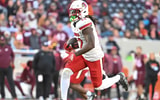 Nov 1, 2025; Blacksburg, Virginia, USA; Louisville Cardinals running back Keyjuan Brown (22) runs the ball for a touchdown against the Virginia Tech Hokies during the fourth quarter at Lane Stadium. Mandatory Credit: Brian Bishop-Imagn Images