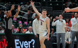 Jan 29, 2025; Coral Gables, Florida, USA; Virginia Cavaliers guard Isaac McKneely (11) reacts after scoring against the Miami Hurricanes during the second half at Watsco Center. Mandatory Credit: Sam Navarro-Imagn Images