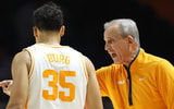 Randy Sartin-Imagn Images | Nov 3, 2025; Knoxville, Tennessee, USA;  Tennessee Volunteers head coach Rick Barnes speaks with guard Ethan Burg (35) during the second half against the Mercer Bears at Thompson-Boling Arena at Food City Center.