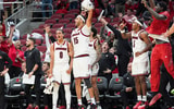 The Cards bench erupts in cheers after Louisville Cardinals guard Cole Sherman (4) hit a three point shot late in the second half as the Cards roll past South Carolina State 104-45 at the KFC Yum! Center Monday night, Nov. 3, 2025.