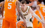 Grace Hollars/IndyStar / USA TODAY NETWORK | Purdue Boilermakers guard Braden Smith (3) watches the ball against Tennessee Volunteers guard Zakai Zeigler (5) on Sunday, March 31, 2024, during the midwest regional championship at the Little Caesars Arena in Detroit. The Purdue Boilermakers defeated the Tennessee Volunteers, 72-66.