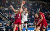 UConn Guard Azzi Fudd takes a shot against Louisville