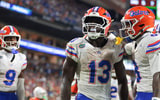 Sep 20, 2025; Miami Gardens, Florida, USA; Florida Gators running back Jadan Baugh (13) celebrates after scoring a touchdown against the Miami Hurricanes during the third quarter at Hard Rock Stadium. Mandatory Credit: Sam Navarro-Imagn Images
