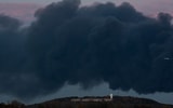 Black blanketed the Louisville sky following a fatal plane crash near Grade Lane on Tuesday, via Jeff Faughender:Courier Journal : USA TODAY NETWORK via Imagn Images