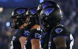 Kentucky players line up during a night game at Kroger Field on 10:25:2025 - Dr. Michael Huang, Kentucky Sports Radio:On3