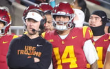 USC head coach Lincoln Riley and quarterback Jayden Maiava look on from the sideline during a game against Northwestern