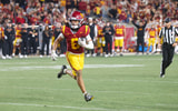 USC wide receiver Makai Lemon runs for a touchdown against Northwestern
