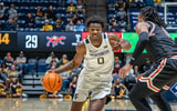 West Virginia forward Brenen Lorient drives to the basket