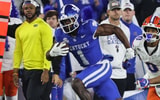 Kentucky WR Kendrick Law runs past a Florida defender at Kroger Field, Dr. Michael Huang, KSR