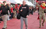 Nov 8, 2025; Louisville, Kentucky, USA; Louisville Cardinals head coach Jeff Brohm greets fans during the Card March before facing off against the California Golden Bears at L&N Federal Credit Union Stadium. Mandatory Credit: Jamie Rhodes-Imagn Images