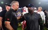 Nebraska football coach Matt Rhule (left) and UCLA interim coach Tim Skipper after the Huskers' 28-21 win over the Bruins