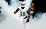 Nov 9, 2025; Miami Gardens, Florida, USA; Miami Dolphins linebacker Jordyn Brooks (20) runs on the field before a game against the Buffalo Bills at Hard Rock Stadium.