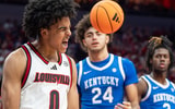 Louisville Cardinals guard Mikel Brown Jr. (0) celebrated after scoring and drawing a foul during the second half as the Louisville Cardinals hosted the Kentucky Wildcats at the KFC Yum! Center on Tuesday, Nov. 11, 2025. The Cardinals defeated the Wildcats 96-88.
