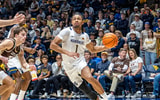 West Virginia guard Jasper Floyd drives against Lehigh