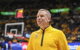 Nov 13, 2025; Morgantown, West Virginia, USA; West Virginia Mountaineers head coach Ross Hodge smiles during pregame introductions before their game against the Pittsburgh Panthers at WVU Coliseum. Mandatory Credit: Ben Queen-Imagn Images