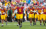 The USC Trojans take the field against the Iowa Hawkeyes