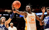 Saul Young/News Sentinel / USA TODAY NETWORK via Imagn Images | Tennessee forward Felix Okpara (34) and Rice guard/forward Nick Anderson (23) go after the rebound during an NCAA college basketball game on November 17, 2025, in Knoxville, Tenn.
