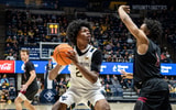 West Virginia freshman guard Amir Jenkins