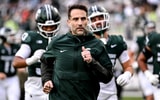 Michigan State's defensive coordinator Joe Rossi runs to the locker room before the game against Penn State on Saturday, Nov. 15, 2025, at Spartan Stadium in East Lansing. - Nick King, USA TODAY Sports.