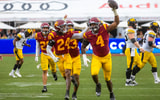 USC Trojans defensive tackle Jahkeem Stewart celebrates following an interception against Iowa