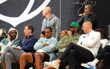 July 19, 2025; North Augusta, South Carolina, USA; NBA star Carmelo Anthony (center right) talks to University of Kentucky basketball coach Mark Pope (right) during the Team Why Not and Team CP3 game at the Nike EYBL Peach Jam at Riverview Park Activity Center. Team Why Not won 66-63. Mandatory Credit: Katie Goodale - Augusta Chronicle/USA TODAY NETWORK