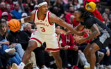 Nov 21, 2025; Cincinnati, Ohio, USA; Louisville Cardinals guard Ryan Conwell (3) dribbles the ball against Cincinnati Bearcats guard Day Day Thomas (1) in the second half at Heritage Bank Center. Mandatory Credit: Aaron Doster-Imagn Images