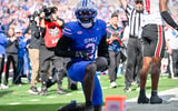 Nov 22, 2025; Dallas, Texas, USA; SMU Mustangs wide receiver Jordan Hudson (2) celebrates after he scores a touchdown against the Louisville Cardinals during the first half at Gerald J. Ford Stadium. Mandatory Credit: Jerome Miron-Imagn Images