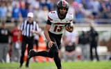 Nov 22, 2025; Dallas, Texas, USA; Louisville Cardinals quarterback Deuce Adams (13) runs with the ball against the SMU Mustangs during the first half at Gerald J. Ford Stadium. Mandatory Credit: Jerome Miron-Imagn Images