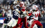 Nebraska football QB TJ Lateef (14) and OL Turner Corcoran against Penn State